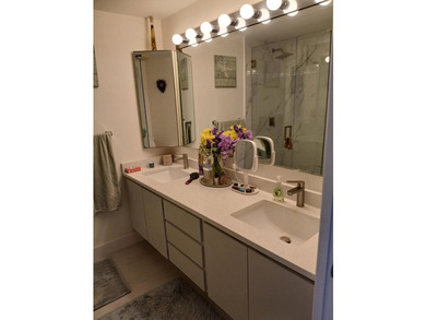 Centrally located large townhome with tile on 1st floor, wood on - photo 18