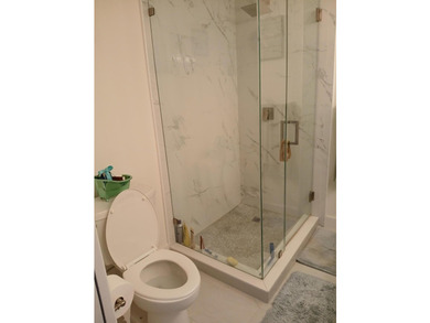 Centrally located large townhome with tile on 1st floor, wood on - photo 22