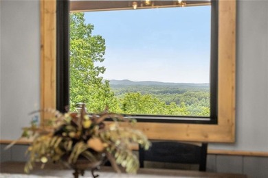 Perched high above the mountains in one of North Georgia's most - photo 28