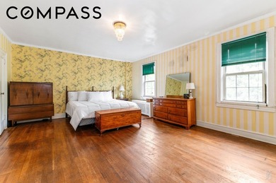 A rare opportunity to own a landmarked 1920s brick townhouse in - photo 8