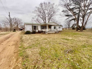 Lake Home Off Market in Newbern, Tennessee