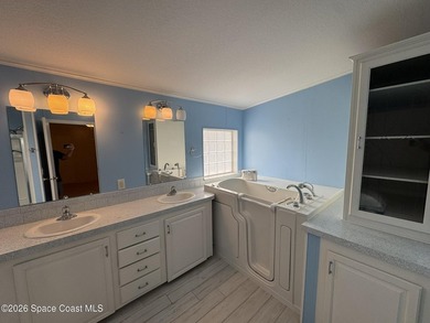 Rarely available lakefront property! This 2-bedroom, 2-bath home - photo 11