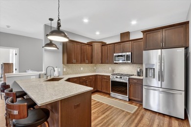 Welcome home to this beautifully designed 2025-built condo - photo 11