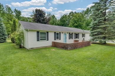 Welcome to this well maintained 3-bedroom, 2-bath home located - photo 1