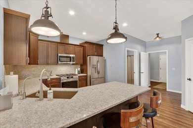 Welcome home to this beautifully designed 2025-built condo - photo 12