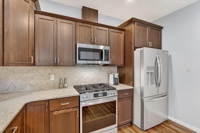 Welcome home to this beautifully designed 2025-built condo - photo 14