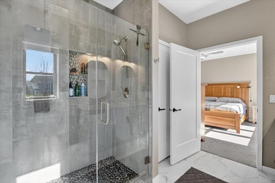 Welcome home to this beautifully designed 2025-built condo - photo 23