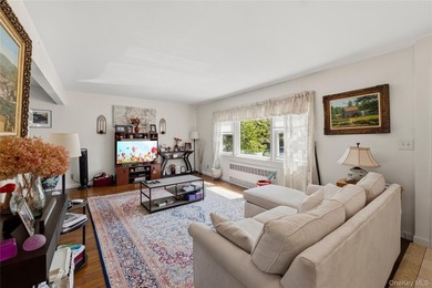 Spacious and well-maintained legal two-family home located in - photo 3