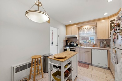 Spacious and well-maintained legal two-family home located in - photo 5