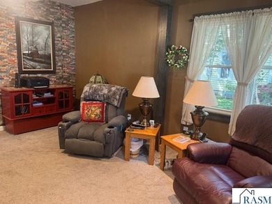 Welcome Home! This tastefully decorated home offers warmth and - photo 2