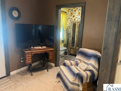 Welcome Home! This tastefully decorated home offers warmth and - photo 3