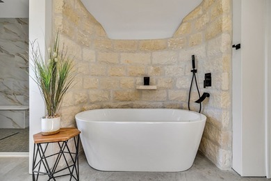 Nestled on 4.087 acres in the Texas Hill Country, this modern