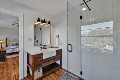 Nestled on 4.087 acres in the Texas Hill Country, this modern