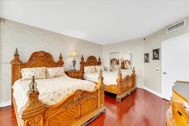 An elegant 3-bedroom residence in the prestigious, gated enclave