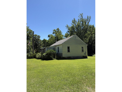 Situated on a beautiful 2-acre property with a pond on a corner - photo 5