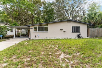 This beautifully updated concrete block home has been - photo 1
