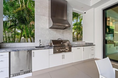 An artful modern showplace for indoor/outdoor entertaining, this - photo 50