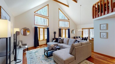 Step into this warm and inviting 3-bedroom, 2-bath chalet - photo 5