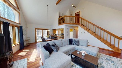 Step into this warm and inviting 3-bedroom, 2-bath chalet - photo 6