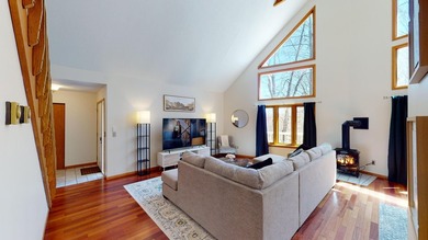 Step into this warm and inviting 3-bedroom, 2-bath chalet - photo 7