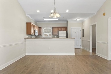 Enjoy the tranquil views of the pond and shimmering community - photo 11