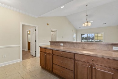 Enjoy the tranquil views of the pond and shimmering community - photo 12