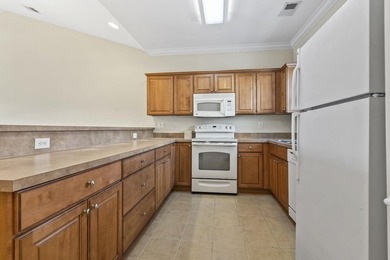 Enjoy the tranquil views of the pond and shimmering community - photo 13
