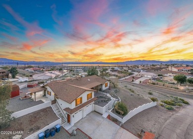 EXPERIENCE SWEEPING, UNOBSTRUCTED LAKE VIEWS FROM THIS - photo 3