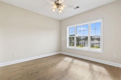 Enjoy the tranquil views of the pond and shimmering community - photo 21