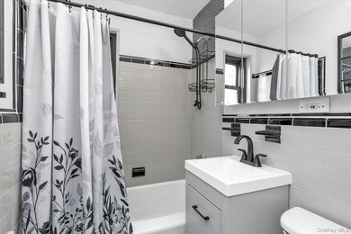 Welcome home to this sun-filled spacious renovated two-bedroom - photo 12