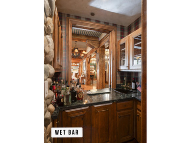 Quintessential log & stone Creekside Lodge estate. Near the base - photo 12