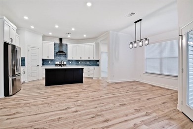 Discover this stunning home set on a spacious .50-acre wooded - photo 7