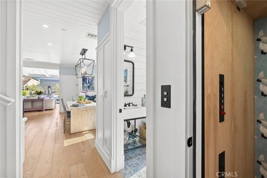 Indulge in luxurious coastal living with this fully furnished - photo 11