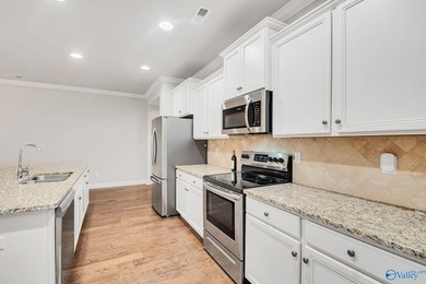 WELCOME HOME! This townhome is in the BEAUTIFUL Lake Forest - photo 11
