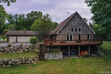 South Branch Shiawassee River  Home For Sale in Howell Michigan