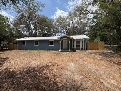 Welcome to this beautifully renovated 4-bedroom, 3-bath home - photo 1