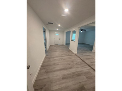 Welcome to this beautifully renovated 4-bedroom, 3-bath home - photo 3