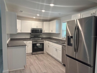 Welcome to this beautifully renovated 4-bedroom, 3-bath home - photo 5