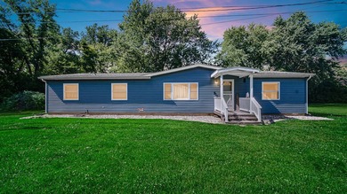 Located near Lower Fish Lake, this 3-bedroom, 2-bath home offers - photo 1
