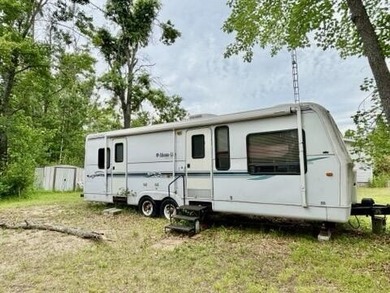 VACANT LOT WITH LAKE ACCESS. Don't miss out on this great lot - photo 1
