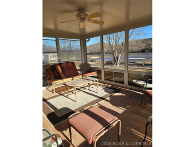 This lakefront homes has many pluses: one level living, attached - photo 14