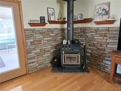 This lakefront homes has many pluses: one level living, attached - photo 17