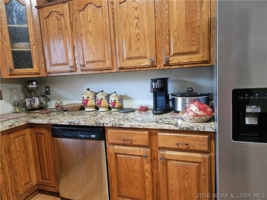 This lakefront homes has many pluses: one level living, attached - photo 22