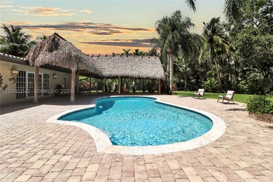 Nestled on a quiet cul-de-sac on one of the largest lots in - photo 3