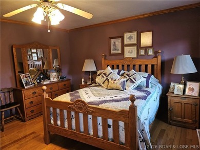 This lakefront homes has many pluses: one level living, attached - photo 28