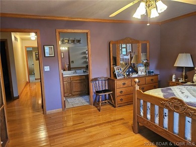 This lakefront homes has many pluses: one level living, attached - photo 31