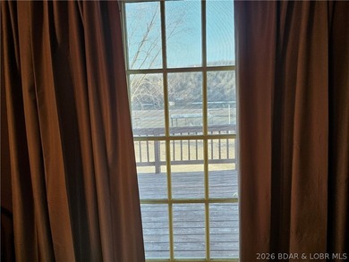 This lakefront homes has many pluses: one level living, attached - photo 32