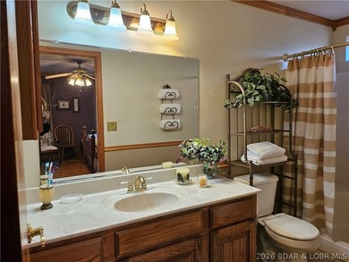 This lakefront homes has many pluses: one level living, attached - photo 34