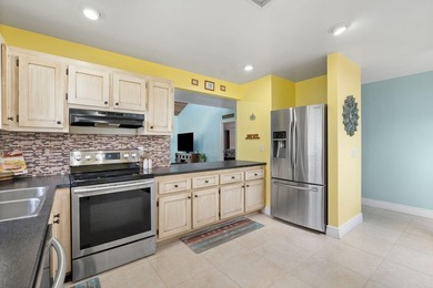 Welcome home to this spacious 3-bed, 2-bath corner Villa in a - photo 6