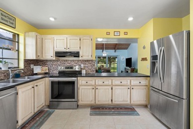 Welcome home to this spacious 3-bed, 2-bath corner Villa in a - photo 7